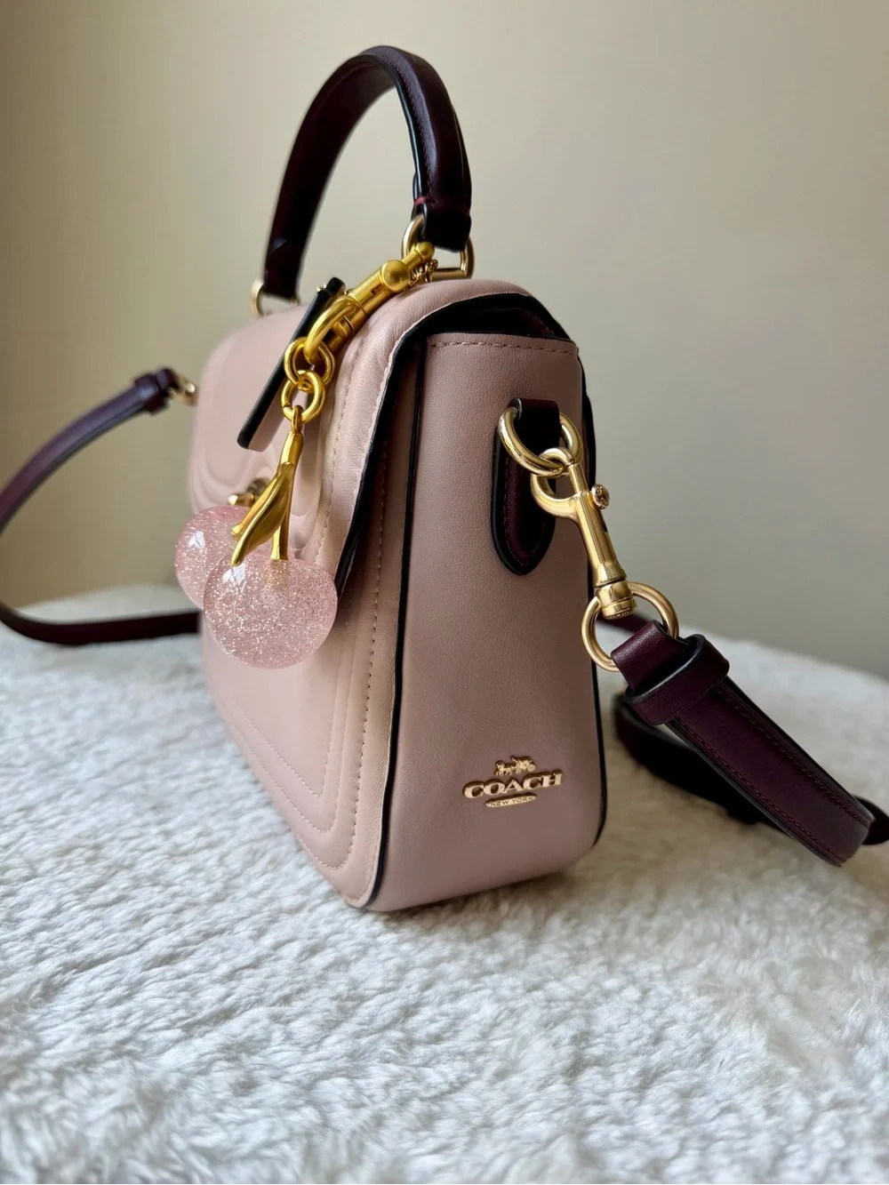 Coach Marlie Top Handle bag  Quilted Leather in pink with charm